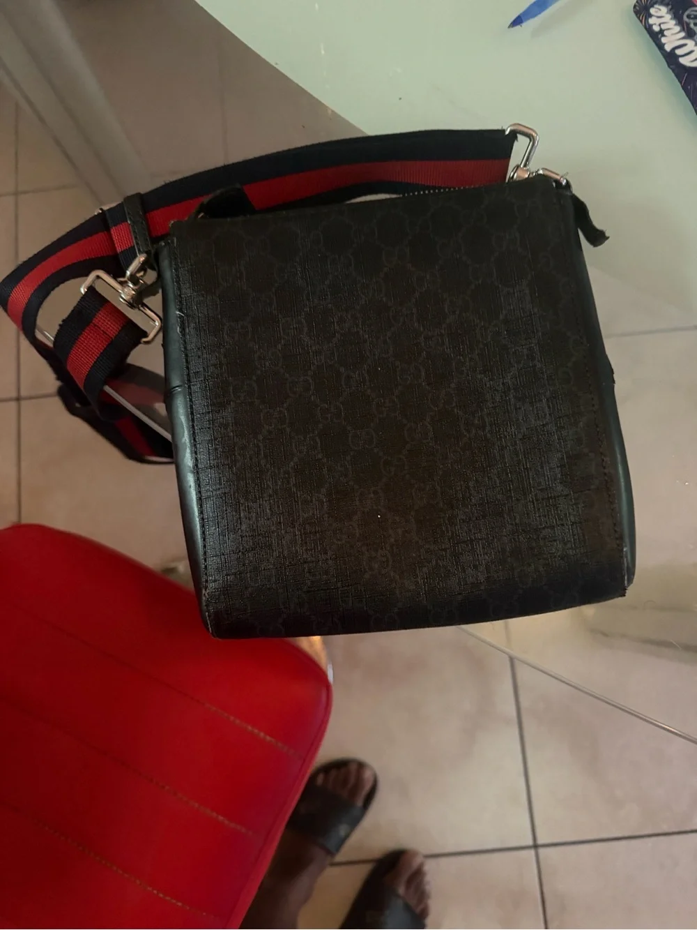 Black Men’s Crossbody Bag with Red-Striped Strap